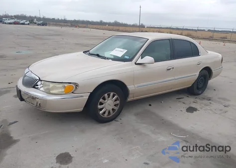 2000 Lincoln Continental z USA, uszkodzony, nr VIN 1LNHM97V3YY892072